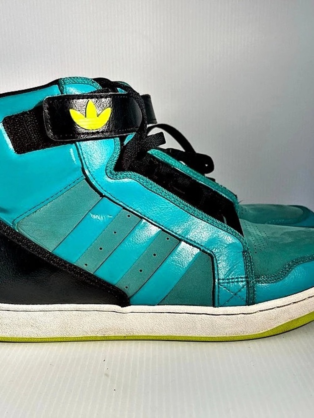 adidas Roundhouse Mid High-Top Sneakers in Blue & Black